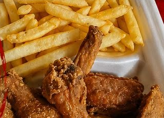 Fried wings with fries